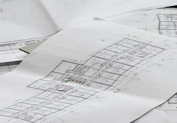 Architekturpläne als Symbol für interoperable digitale Verwaltung und öffentliche IT-Architektur
