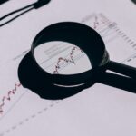 Magnifying glass over service reports as audit evidence for ISO 20000