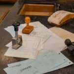 Dokumente und Stempel fuer den ITIL-Version-5-Uebergang